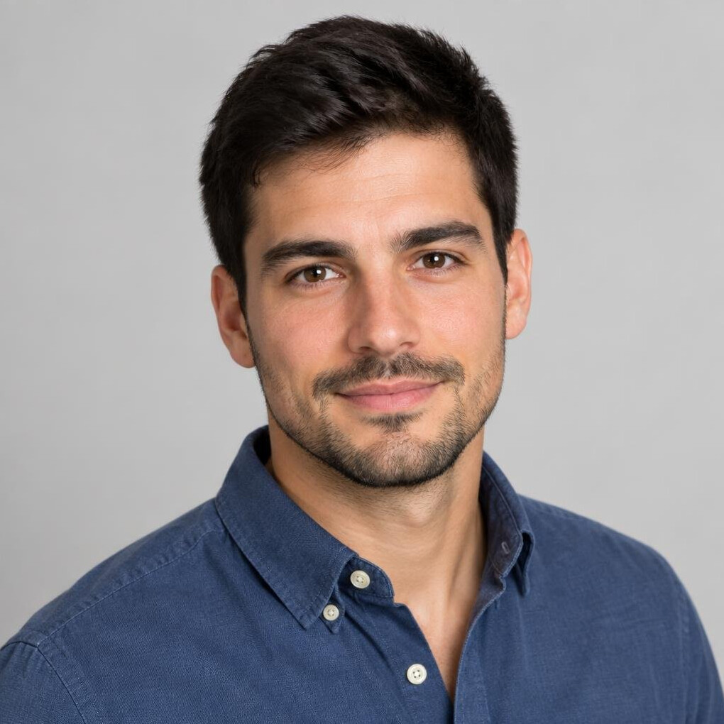 Studio portrait of a young Portuguese man with short hair
